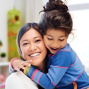 mother and daughter hugging